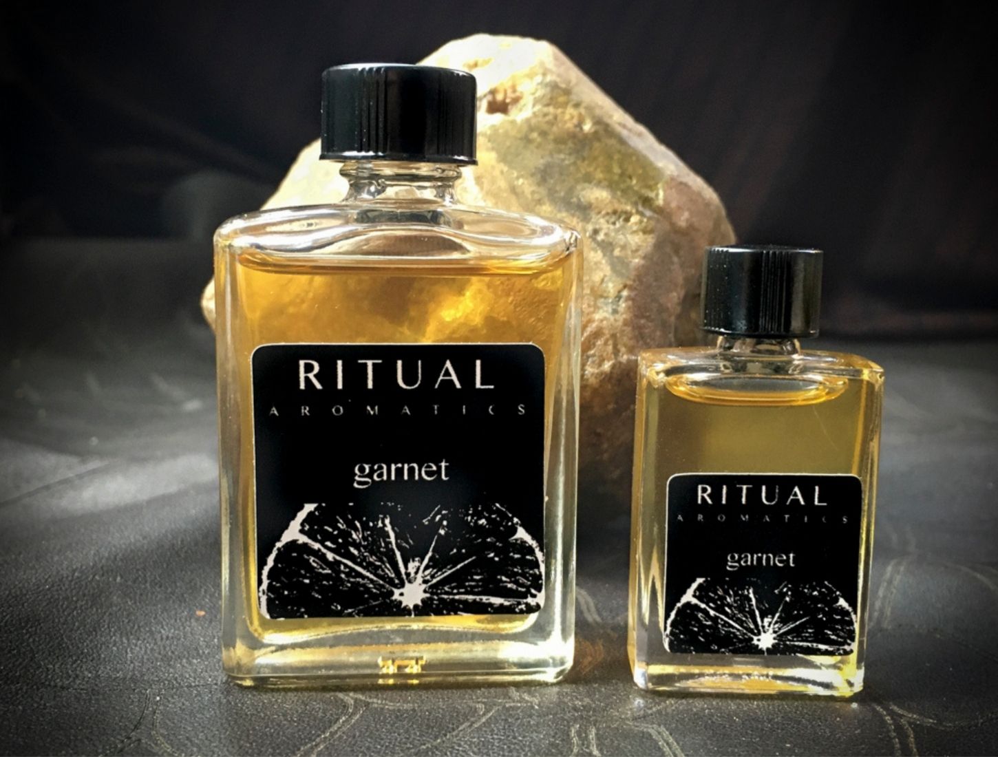 Ritual Aromatics Garnet Natural Perfume 5ml and 15 ml bottle with green garnet