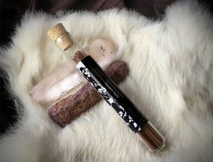 Ritual Aromatics Heart Felt Japanese Incense Sticks in a glass vial on rabbit full with a ruby and kunzite